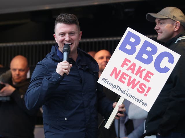 Tommy Robinson addresses supporters outside the BBC in Salford's Media City