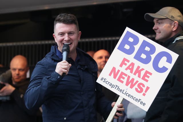 Tommy Robinson addresses supporters outside the BBC in Salford's Media City