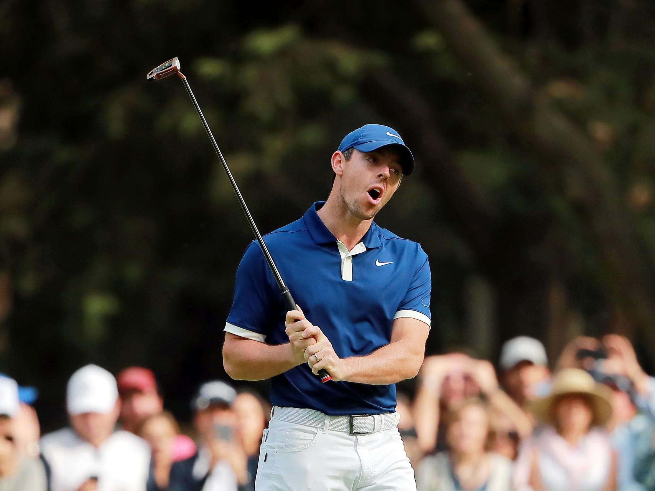 Rory McIlroy reacts on the 15th green during the third round