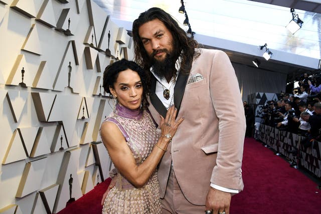 Jason Momoa and Lisa Bonet attend the 2019 Oscars.