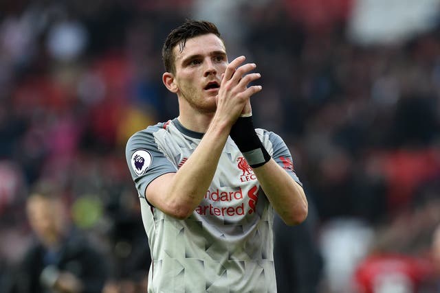 Andrew Robertson of Liverpool shows his appreciation to the fans