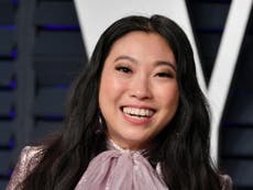 Crazy Rich Asians star Awkwafina swigs tequila from handbag at Oscars