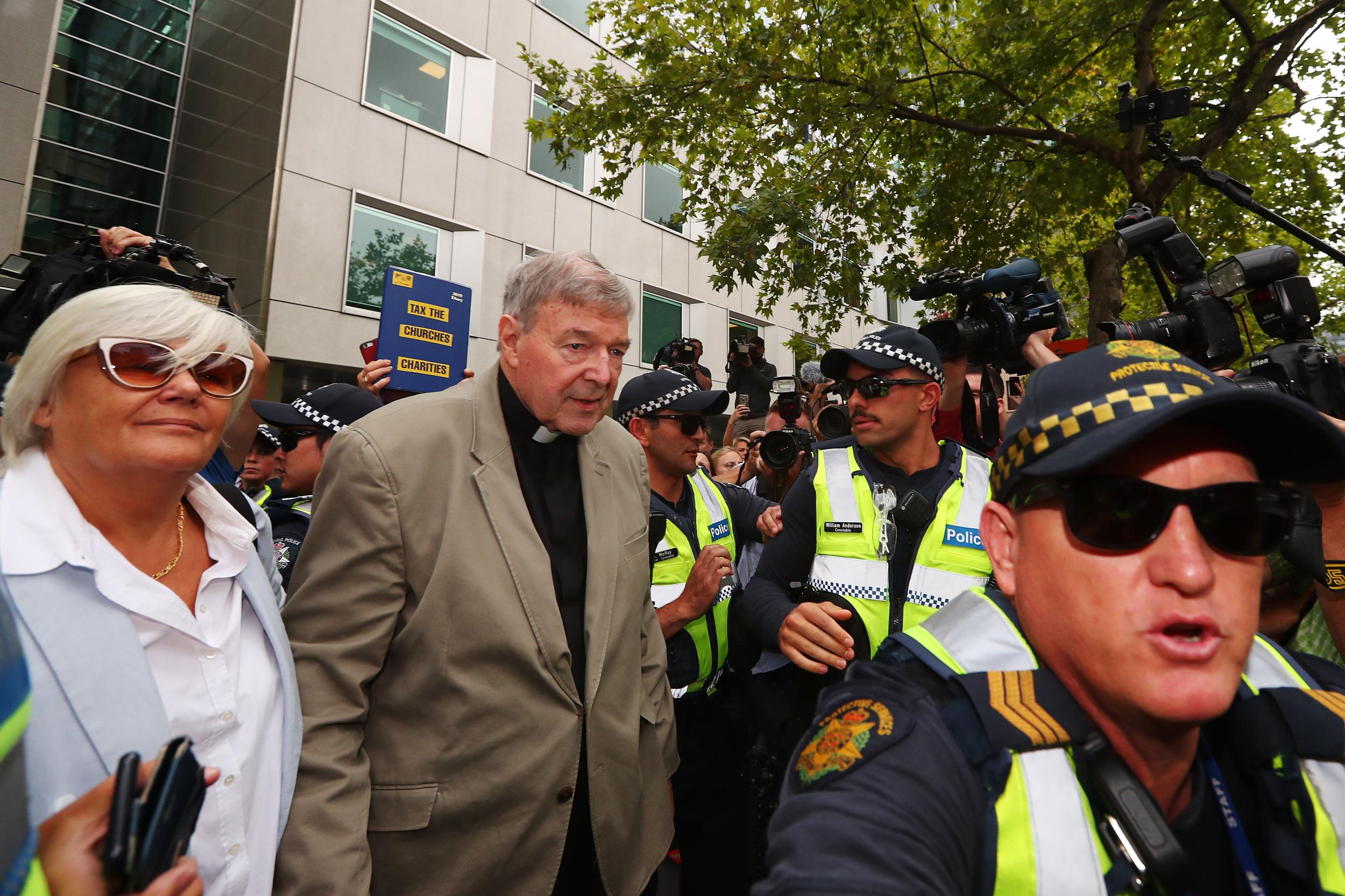 Cardinal George Pell leaves County Court in Melbourne on 26 February