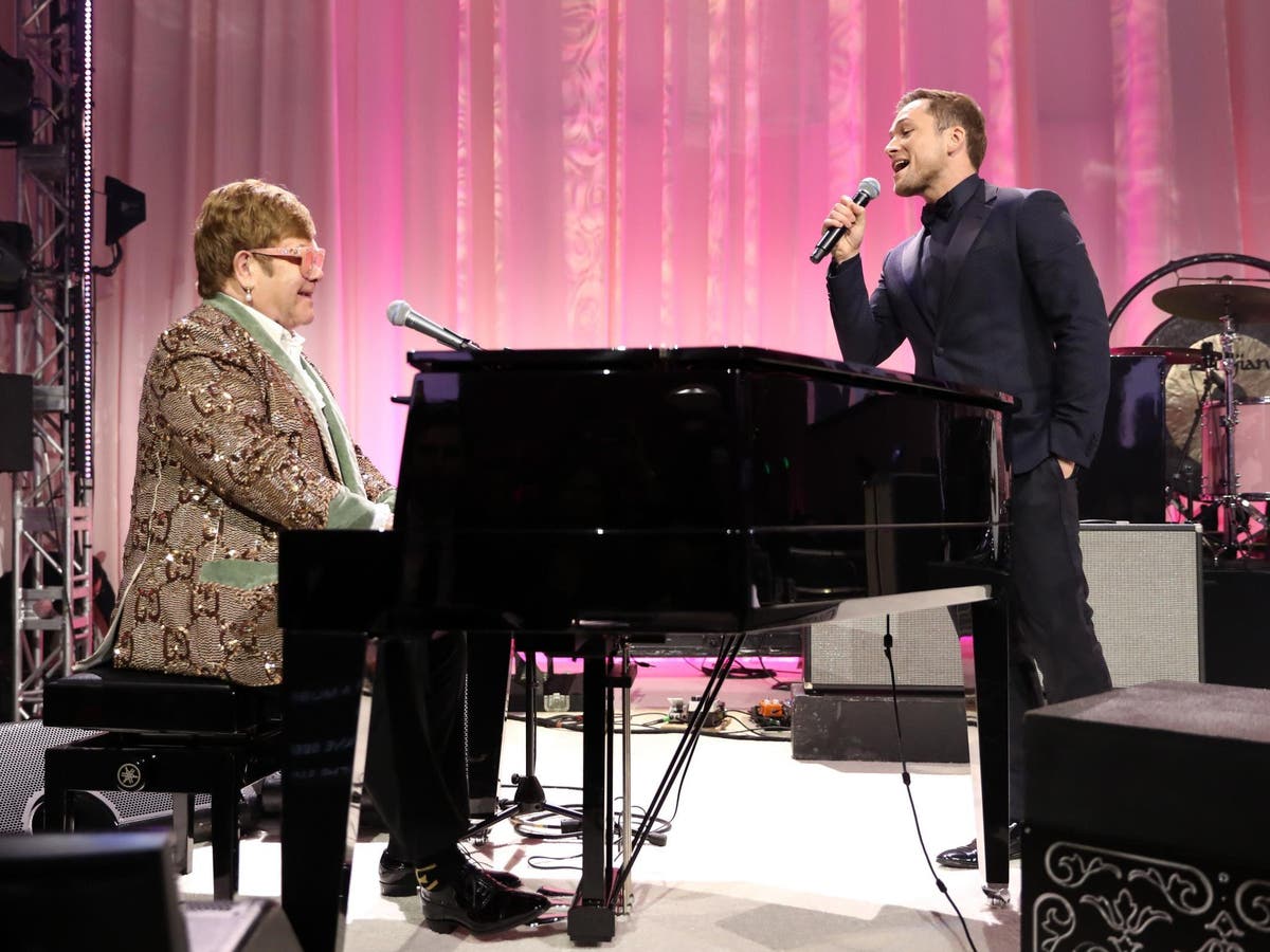 Elton John performs Tiny Dancer with Rocketman star Taron Egerton at Oscars party