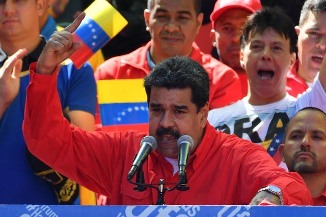 Venezuelan President Nicolas Maduro speaks during a pro-government march in Caracas on 23 February 2019