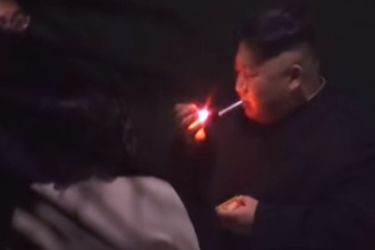 kim jong un lighting cigarette Kim-Trump summit: Dictator's sister holds ashtray during cigarette break on  journey to Vietnam | The Independent