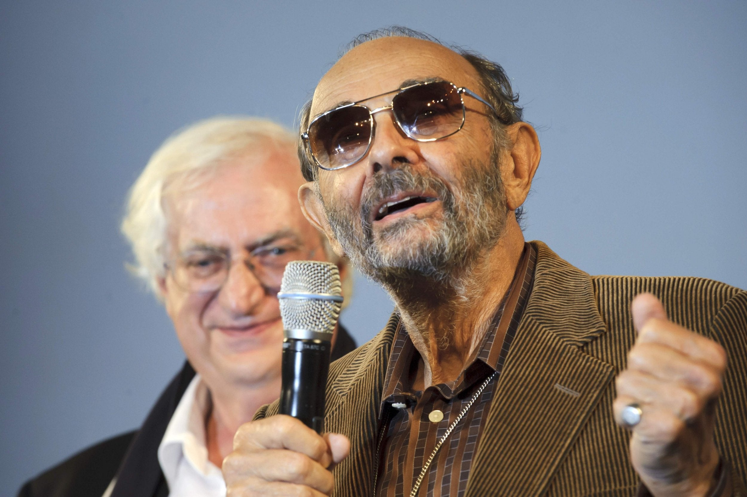 French film director Bertrand Tavernier (left) listens to Donen during the opening ceremony of Lyon’s 2010 Lumière film festival