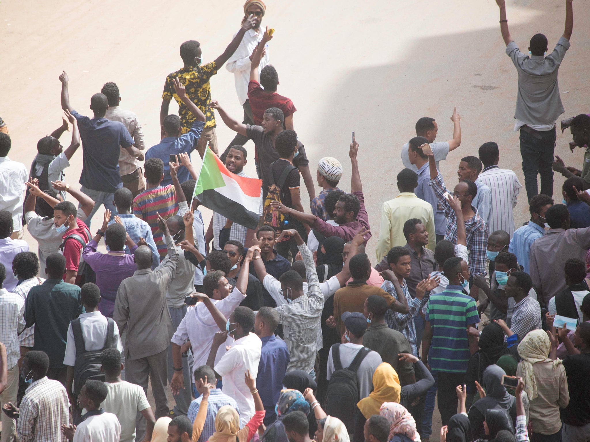 Sudanese demonstrators march during an anti-government protest in Khartoum