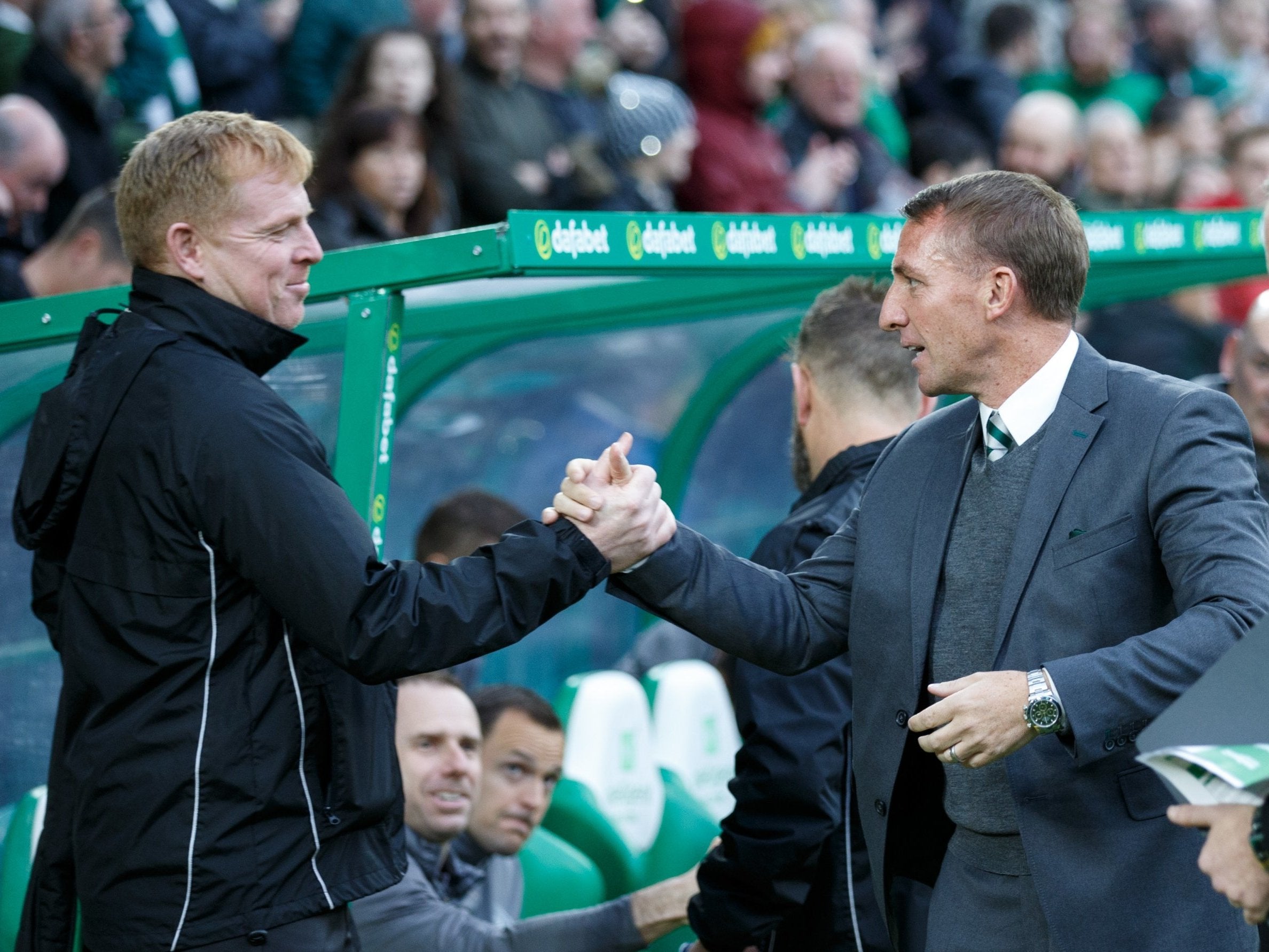 Neil Lennon, left, is set to take over from Brendan Rodgers