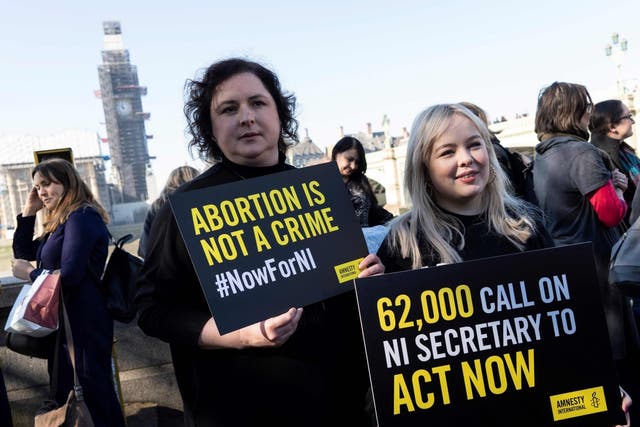 The women formed part of a group of 28 to symbolise the number of people who leave Northern Ireland for England and Wales each week to have an abortion