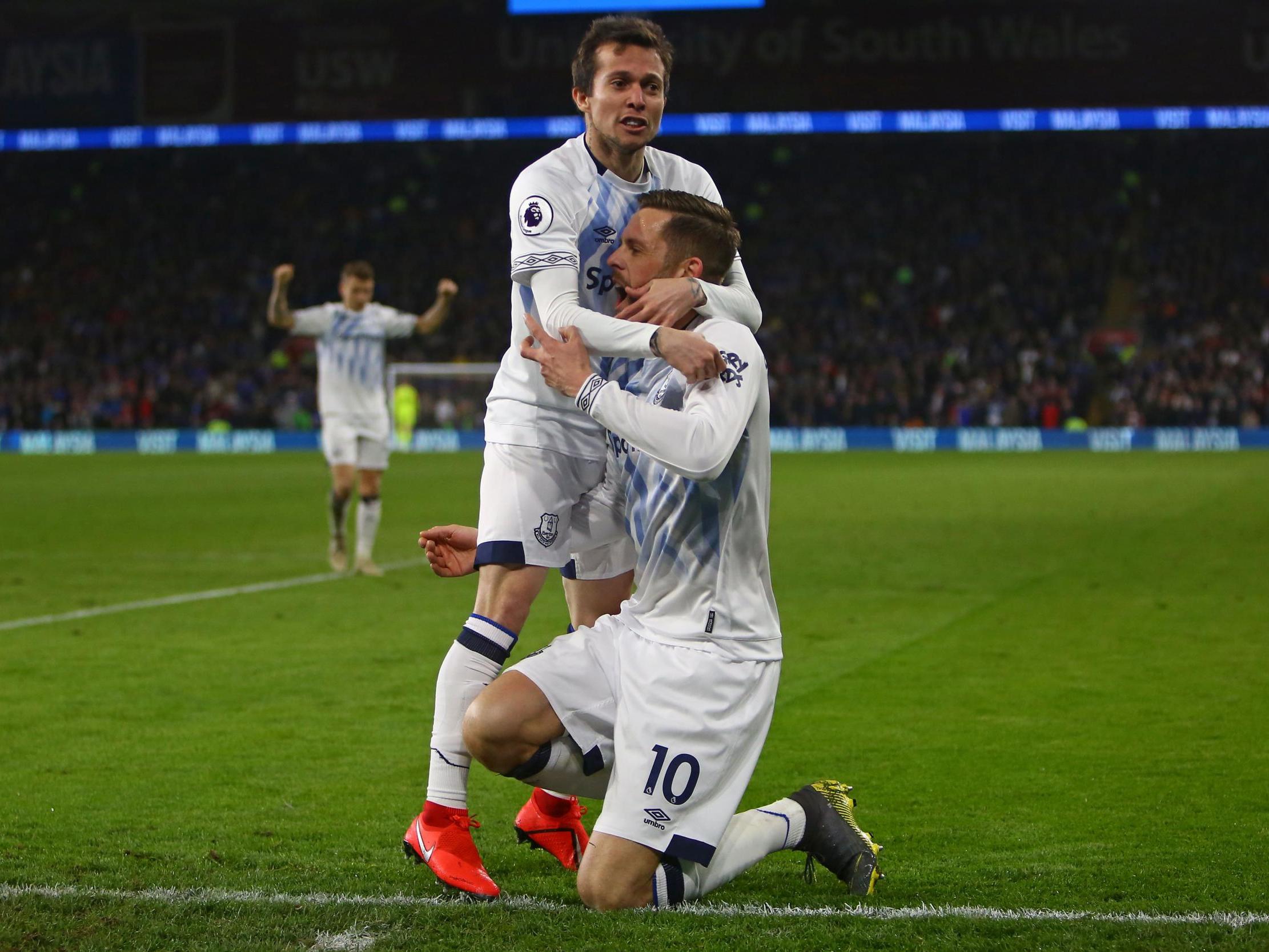 Gylfi Sigurdsson celebrates with Bernard after scoring Brazil’s second goal