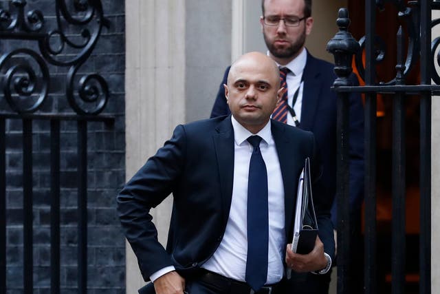 ‘There have long been calls to ban the whole group with the distinction between the two factions derided as smoke and mirrors,’ says home secretary Sajid Javid