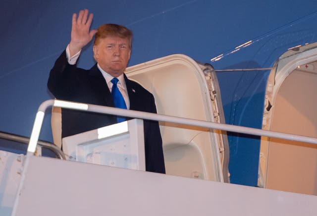 Donald Trump disembarks from Air Force One at Noi Bai International Airport in Hanoi