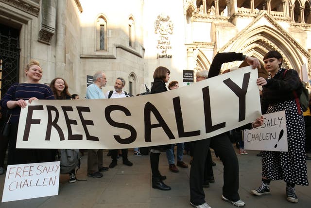 Supporters of Sally Challen outside the Royal Courts of Justice, London, where her 'landmark' murder conviction challenge is being heard