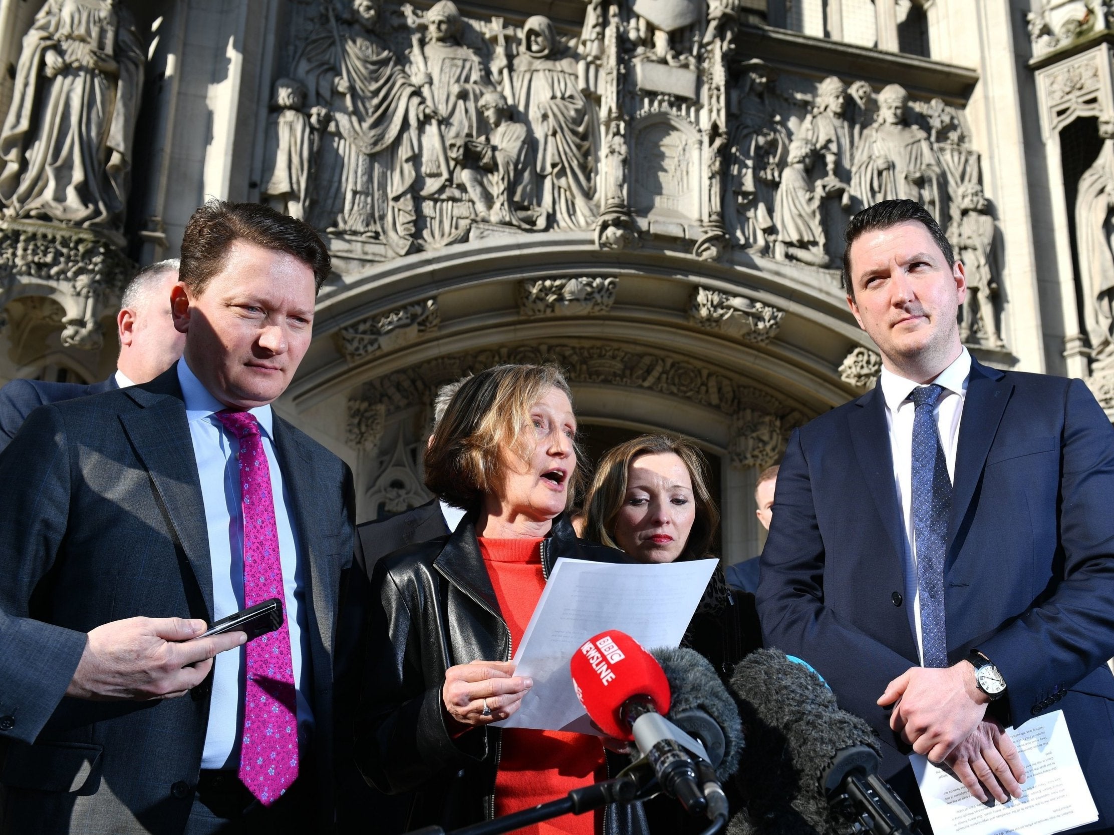 Geraldine Finucane, widow of murdered solicitor Pat Finucane, accompanied by sons John (right) and Michael (left) outside UK Supreme Court