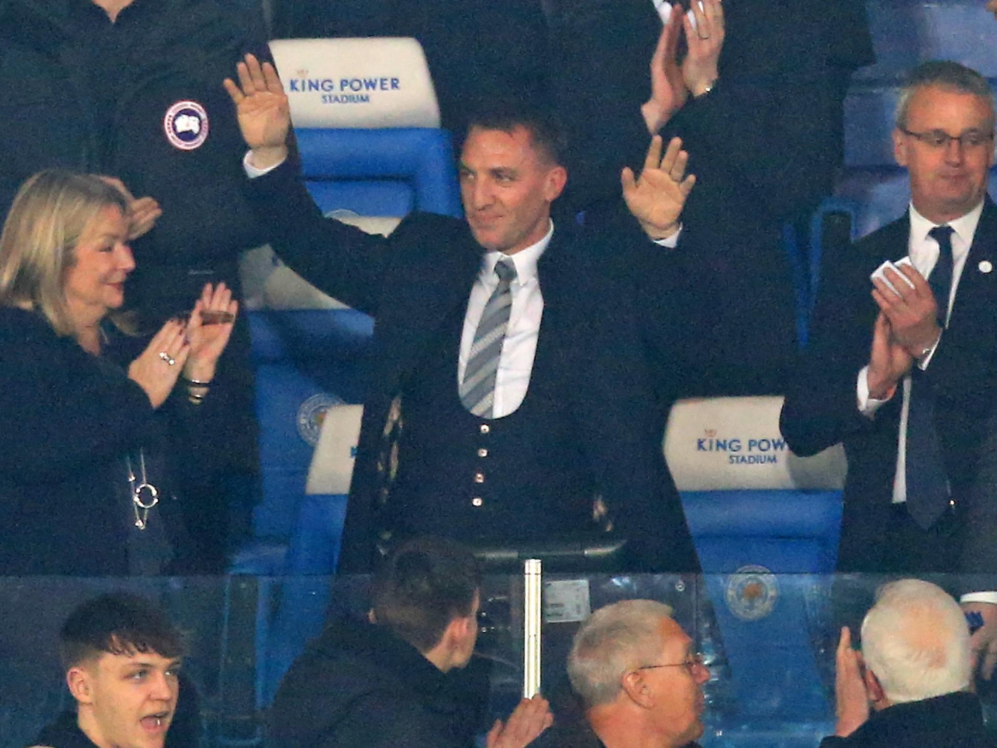 Rodgers salutes the Leicester fans as he attends the King Power Stadium