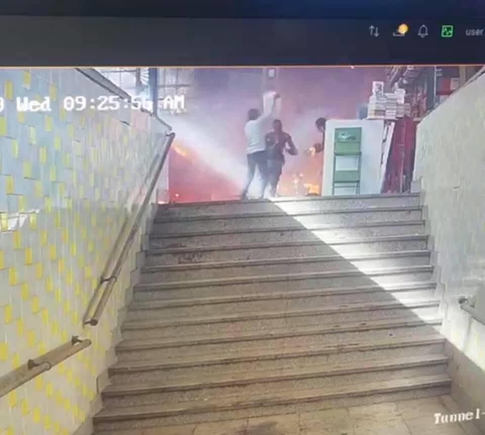 Walid Mardi is captured on CCTV footage rescuing the injured during a fiery train crash in Cairo