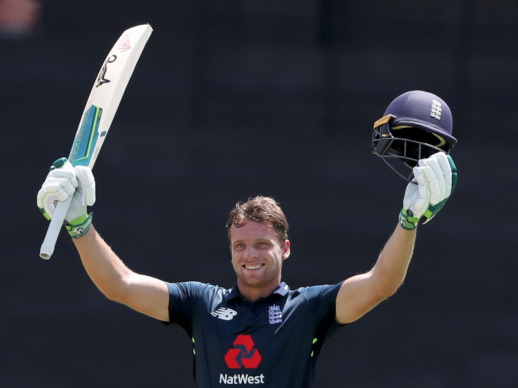 Jos Buttler celebrates his century, a blistering knock that helped England to victory