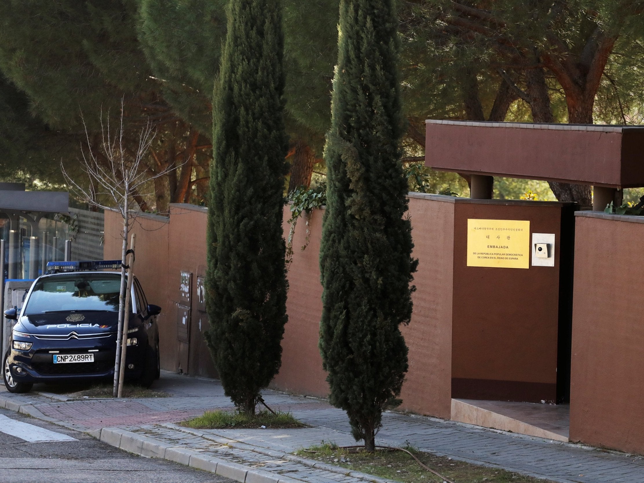 A Spanish National Police car is seen outside the North Korea's embassy in Madrid