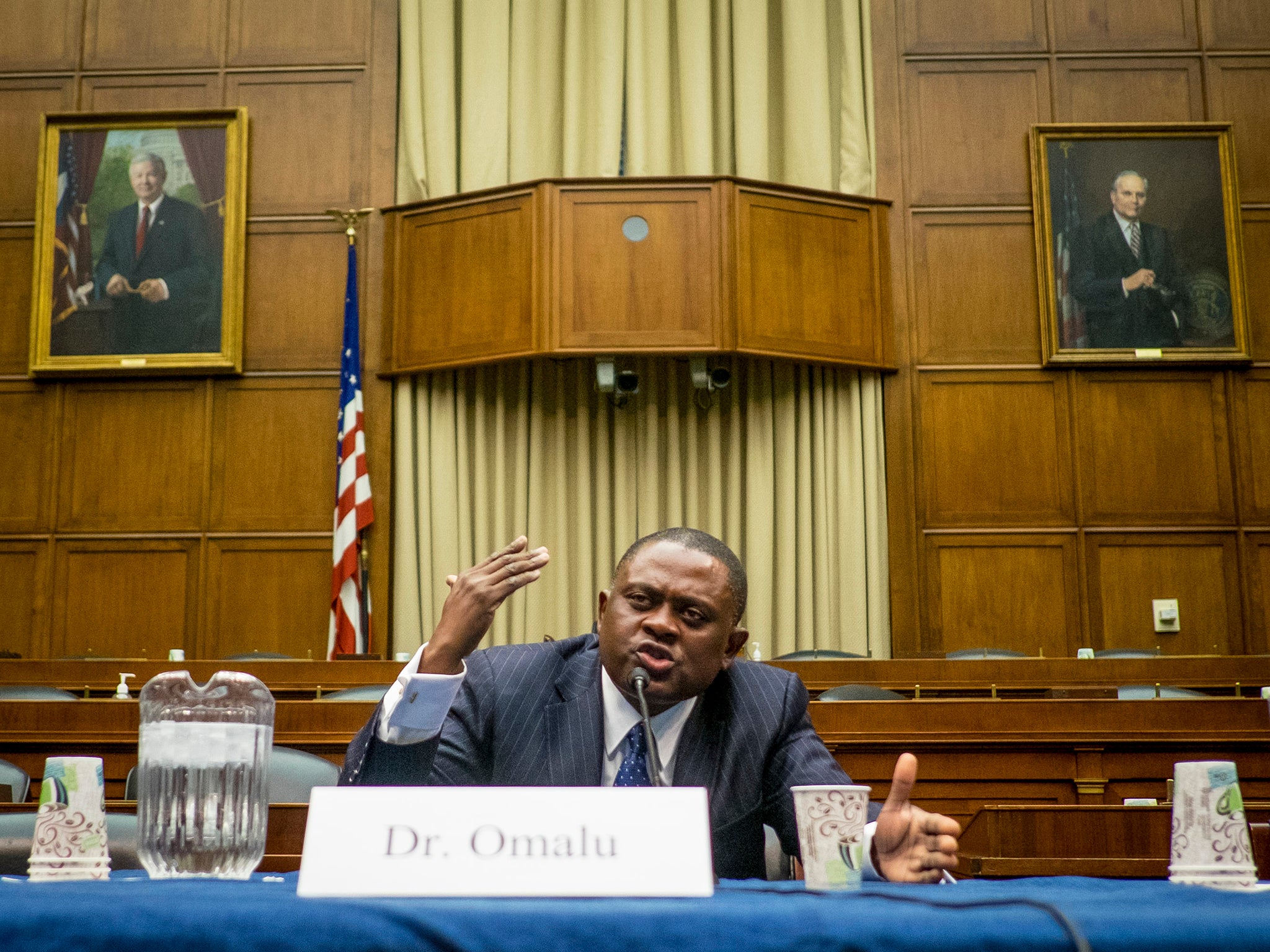 Forensic pathologist and neuropathologist Dr Bennet Omalu, who is credited with discovering chronic traumatic encephalopathy, or CTE, in former NFL players, participates in a briefing on Capitol Hill (Getty)