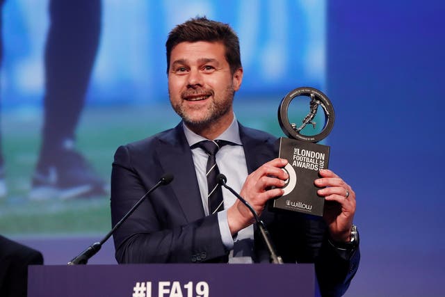 Mauricio Pochettino collects his trophy for winning Manager of the Year at the London Football Awards
