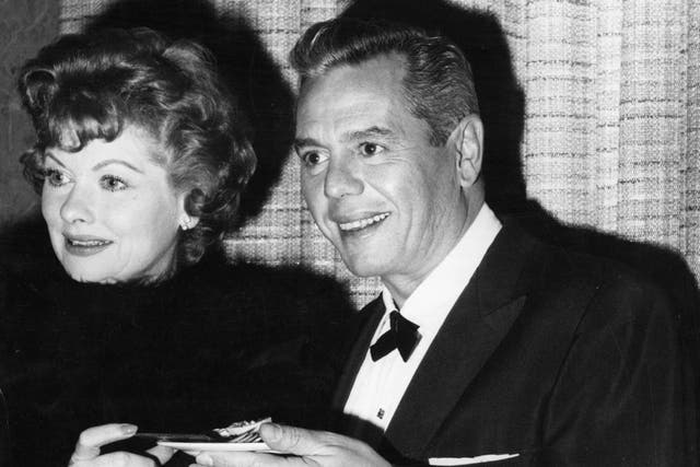Lucille Ball and Desi Arnaz are pictured circa 1955.