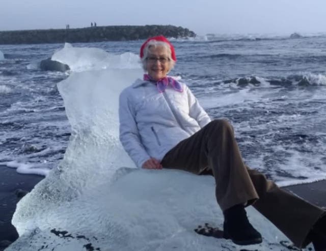 Judith Streng, from Texas, posed on the iceberg during a visit to the Jökulsárlón Lagoon in Iceland