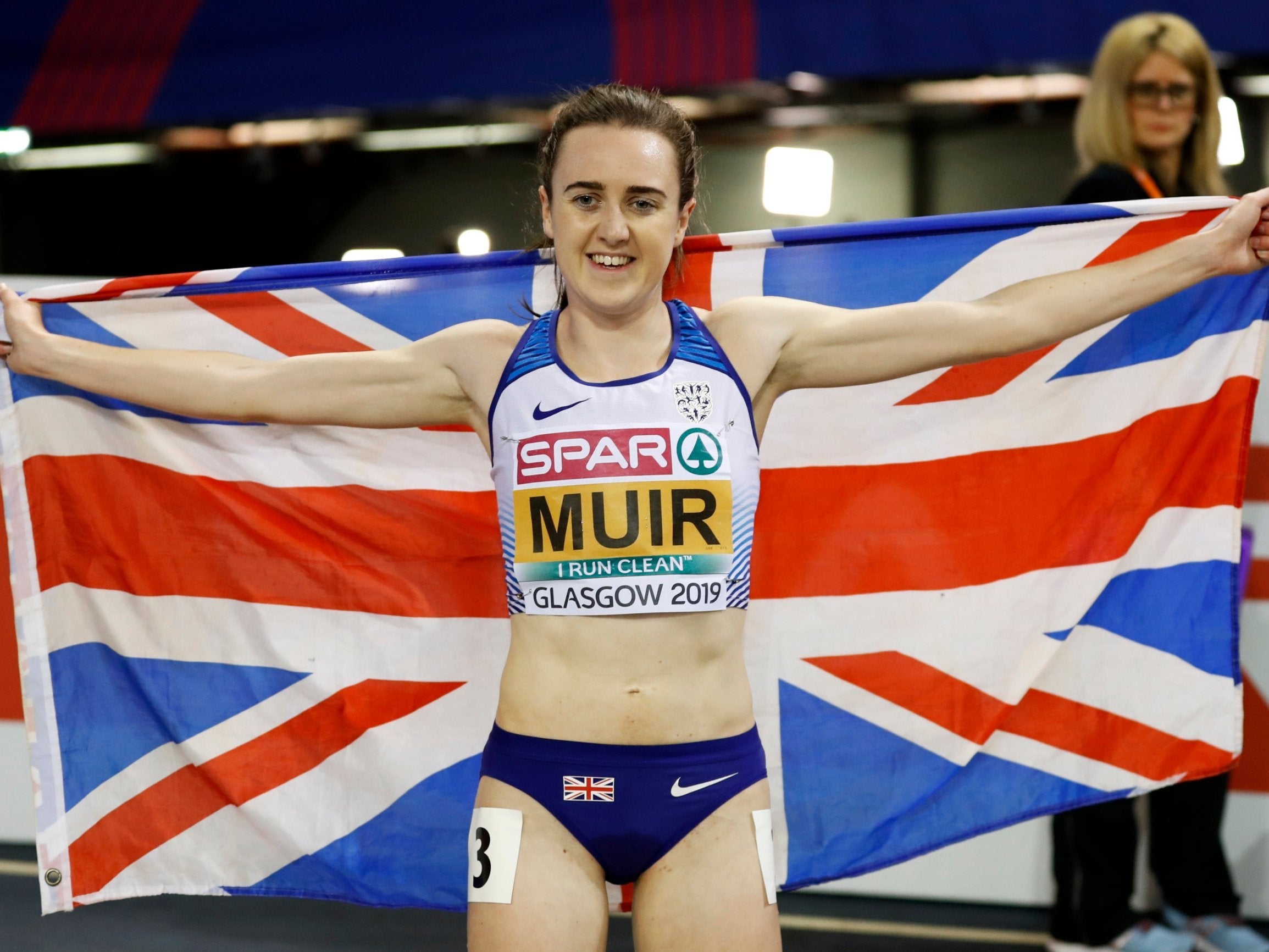 Laura Muir celebrates after winning in the women's 3,000m final at the European Indoor Championships