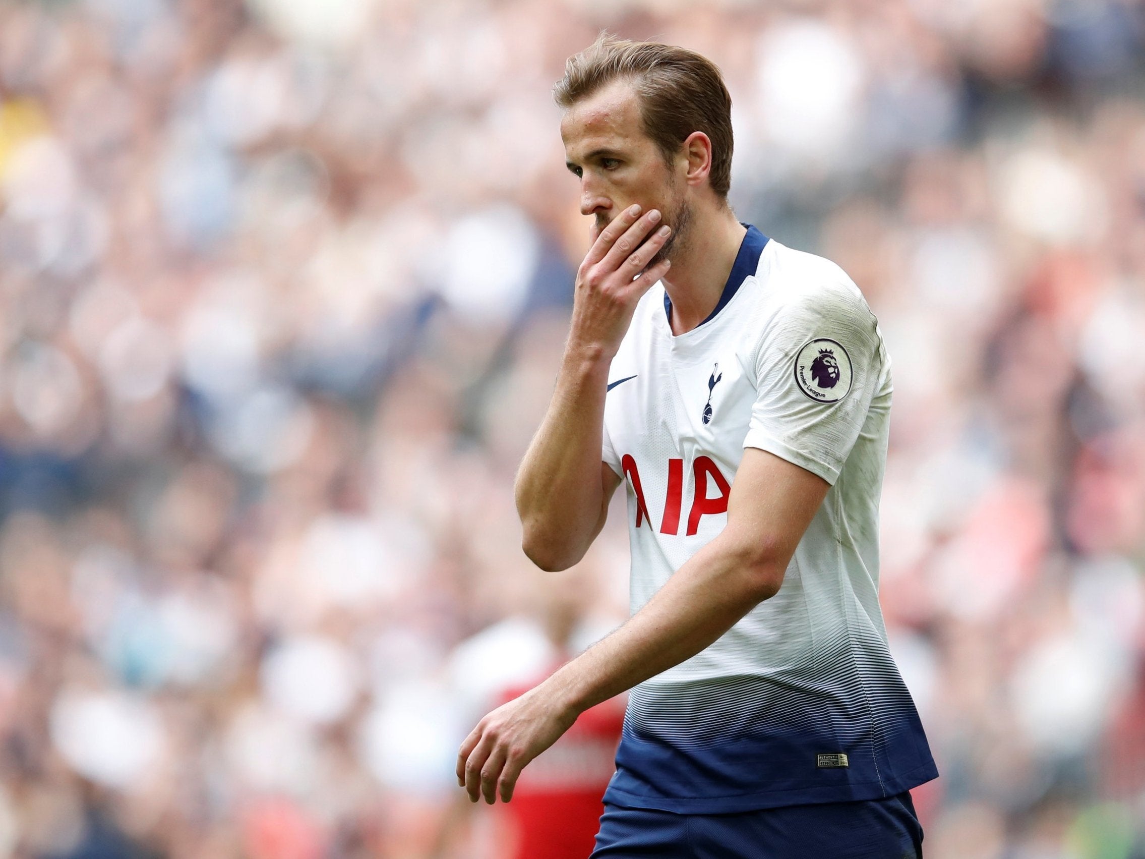 Harry Kane looks concerned aft Arsenal take the lead against Spurs