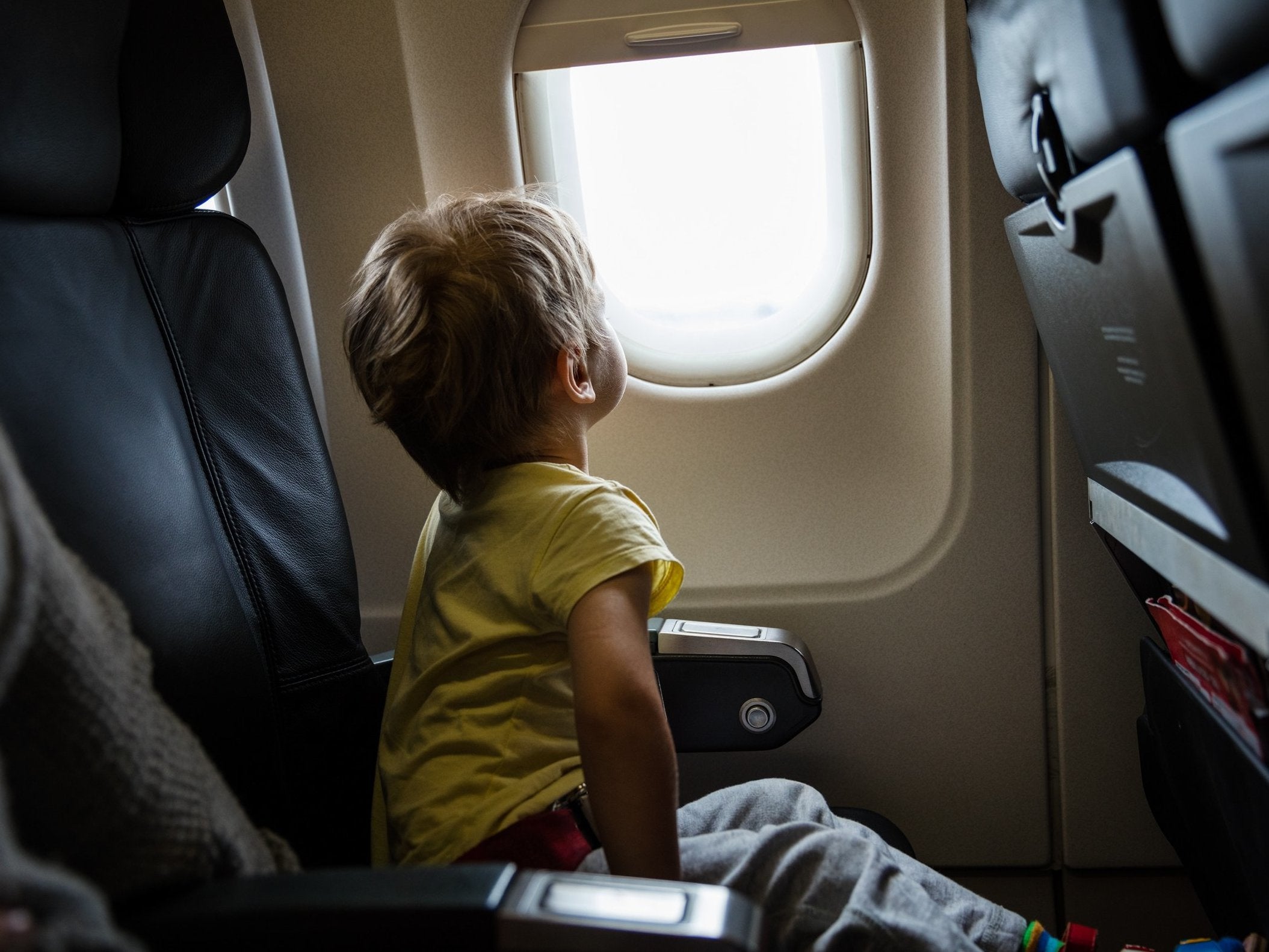 Other passengers may switch to allow parents and children to sit together