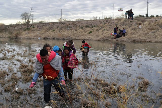 Central American immigrants cross the Rio Grande earlier this year