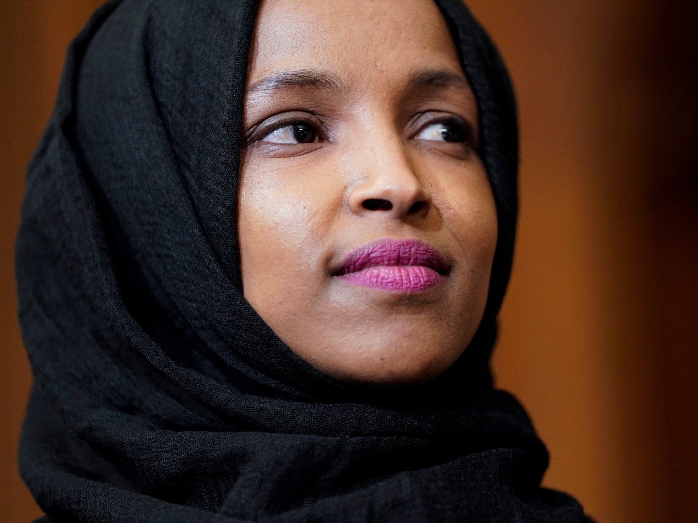 Ilhan Omar listens to lawmakers on Capitol Hill on 26 February