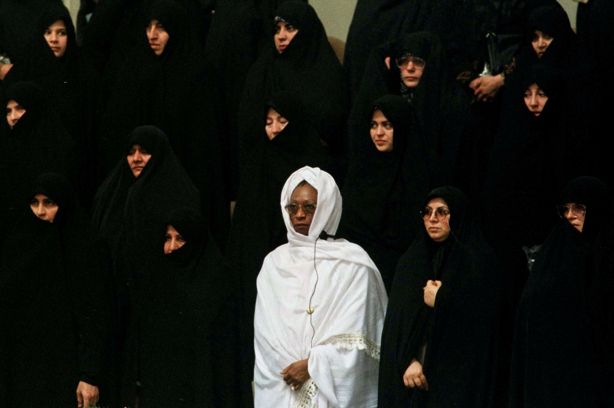 African delegate in white among hosts in Iran in 1997