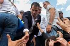 Opposition leader Guaido returns to Venezuela after defying travel ban
