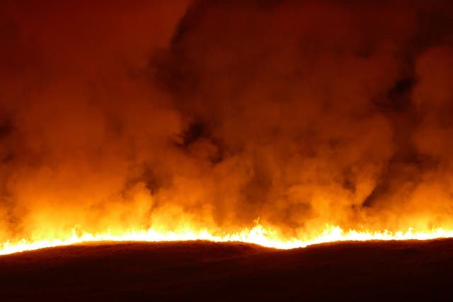 A large blaze engulfs Saddleworth Moor in West Yorkshire