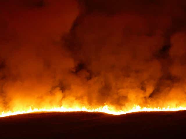 A large blaze engulfs Saddleworth Moor in West Yorkshire