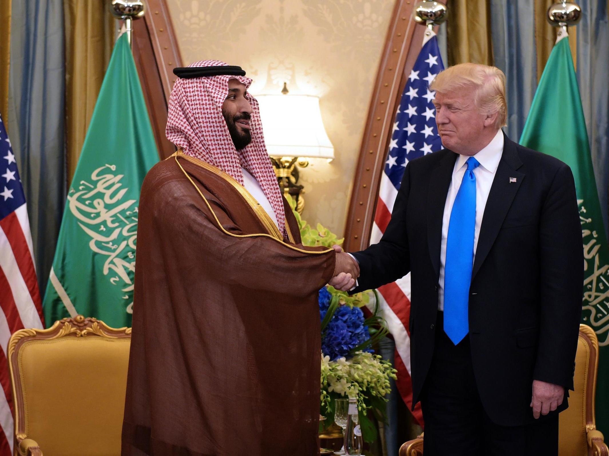 US President Donald Trump and Saudi Deputy Crown Prince Mohammad bin Salman al-Saud take part in a bilateral meeting at a hotel in Riyadh on May 20, 2017.