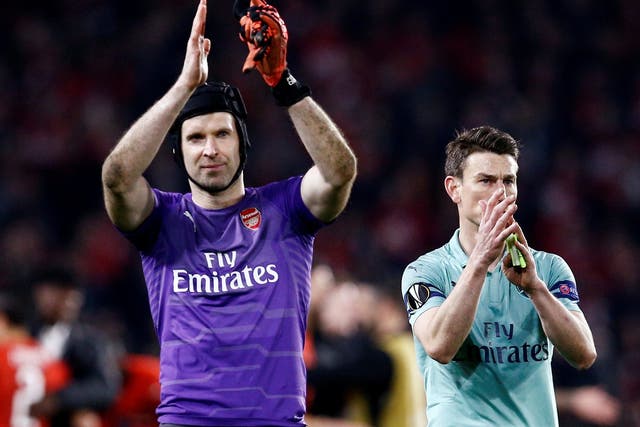 Arsenal's Petr Cech and Laurent Koscielny react after the match