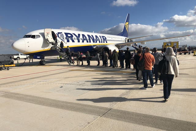 The woman had to be forcibly removed from a Ryanair flight