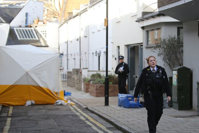 Police activity in Lanfrey Place, West Kensington, London, where a teenager was stabbed on Thursday and later died in hospital