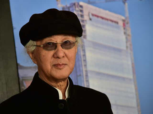 Japanese architect Arata Isozaki poses before a press conference at the "City Life office Tower", a skyscraper under construction in Milan on 29 October, 2014. Isozaki won the Pritzker Prize for his contribution to architecture