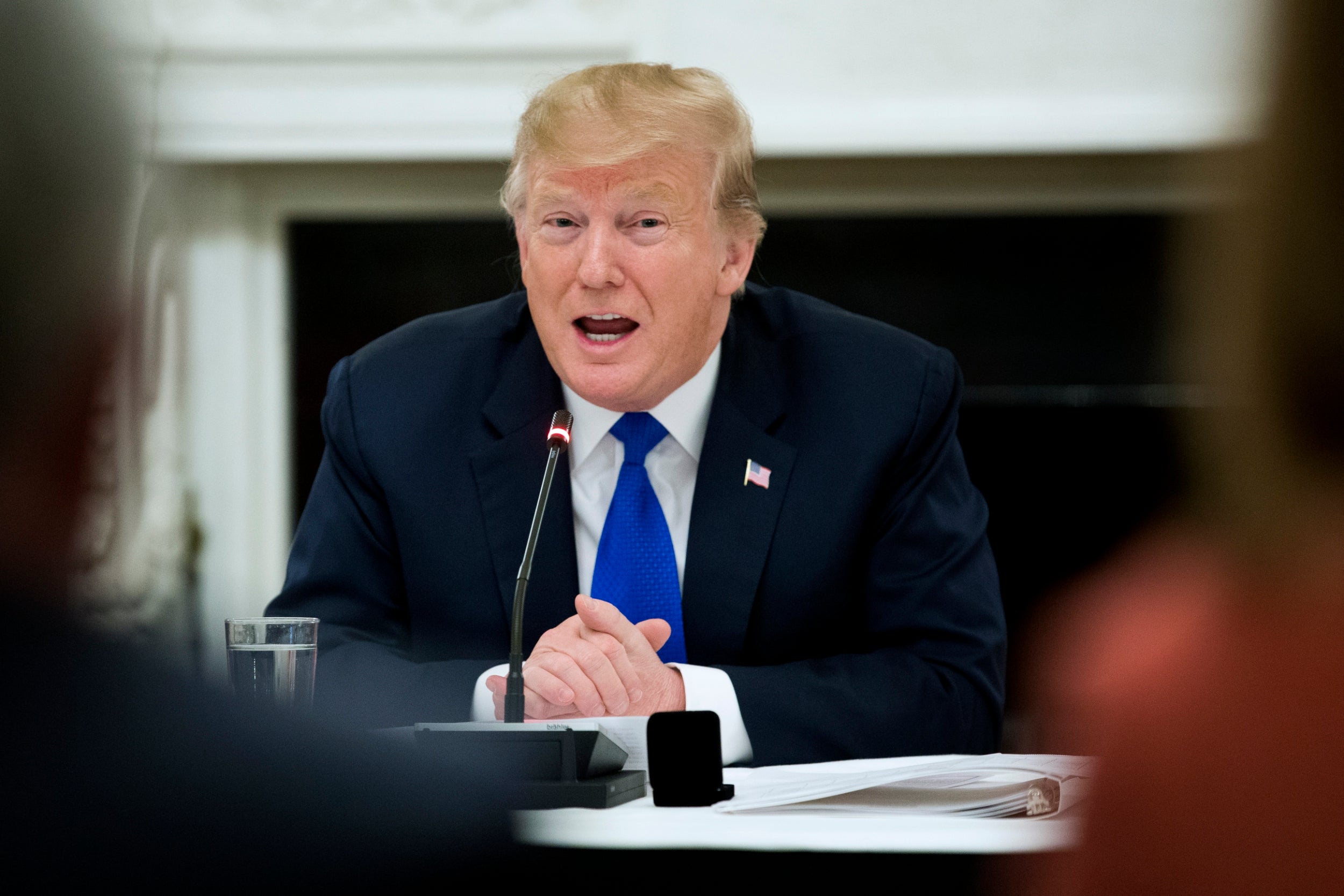 Donald Trump surveyed the damage caused by a slate of deadly tornadoes in Alabama as scandals plagued his White House back in Washington.