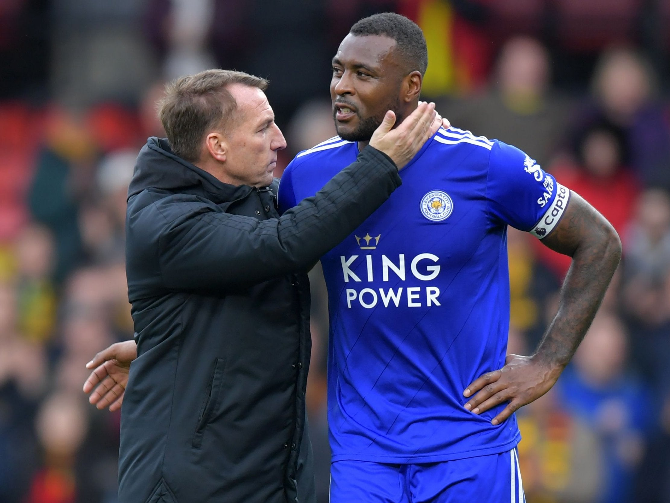 Leicester City manager Brendan Rodgers consoles Wes Morgan