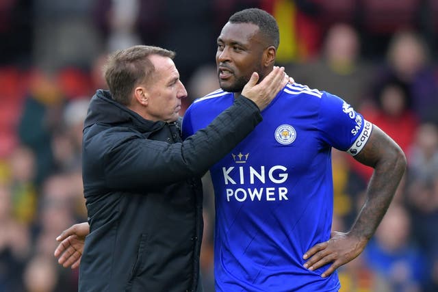 Leicester City manager Brendan Rodgers consoles Wes Morgan