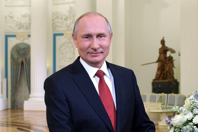 Vladimir Putin delivers a speech on the occasion of International Women's Day