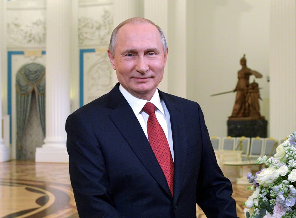 Vladimir Putin delivers a speech on the occasion of International Women's Day