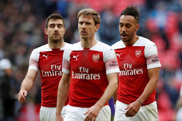 Arsenal's Sokratis Papastathopoulos, Nacho Monreal and Pierre-Emerick Aubameyang