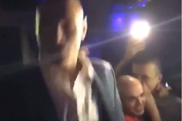 The 6ft 9-inch former heavyweight champion remained in high spirits as members of the crowd at Eden nightclub eagerly tried to film him