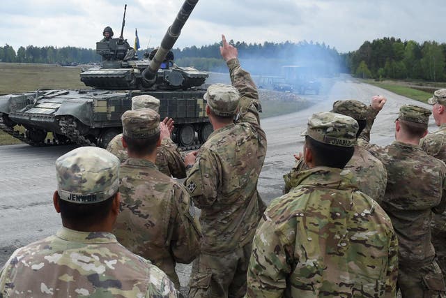 US soldiers welcome the crew of an Ukrainian tank in southern Germany, 2017.