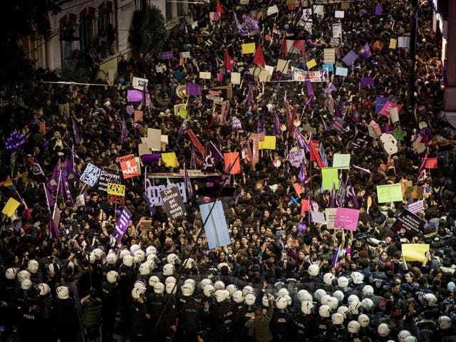 Police move to disperse thousands of women attempting to march down Istanbul's famous Istiklal street.